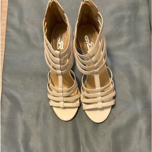 These strappy sandals are stylish.  They were never worn.